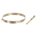 Cartier 18ct 'Love' bangle, signed Cartier AA8522, 33.6gm, width 63mm; with screwdriver (at