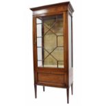 Edwardian mahogany inlaid display cabinet with a single astragal glazed door over a drop front