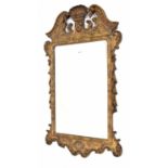 Georgian style giltwood and gesso wall mirror, with a swan neck pediment and carved shell crest over