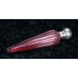 Victorian silver mounted cranberry glass teardrop scent bottle, the silver screw cover by