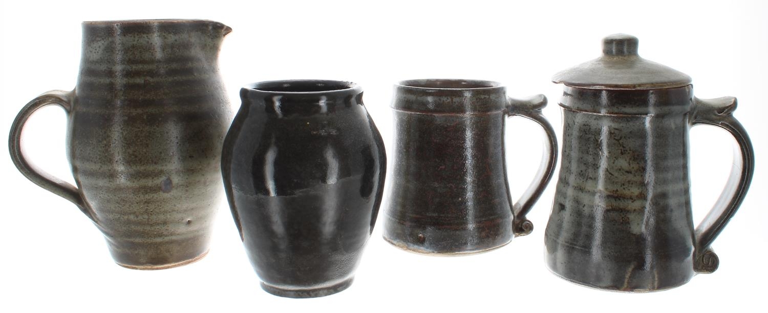 St Ives studio glazed stoneware jug and two tankards, impressed marks, the jug 6.75" high;