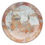 Large Japanese Kutani porcelain charger, decorated with figural warrior scene within panelled