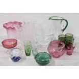 Collection of assorted glassware to include cut glass punch bowls, vases, cranberry glass and