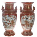 Pair of large Japanese Kutani baluster porcelain vases, each decorated with panels of figures in the
