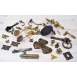 Selection old brass door furniture, hooks, sconces etc; also a foliate trivet