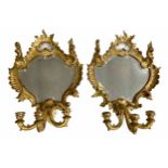 Pair of decorative Florentine style giltwood shield girandole wall mirrors with twin sconces, 19"