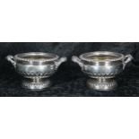 Amendment; Pair of George IV silver salts, of squat campagna form with twin-handles and half reeded