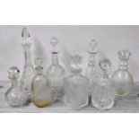 Collection of assorted cut glass decanters including Edinburgh Crystal, tallest 15.5" high (8)