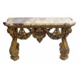 Large and impressive ornate carved giltwood and marble console table, the shaped marble top upon a