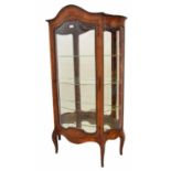 French 19th century kingwood serpentine vitrine display cabinet, with a single bevelled bowed glazed