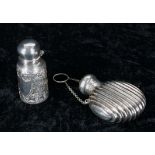 Victorian miniature silver scent bottle, with engraved decorated ground around a vacant shield