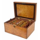 19th century 'birds eye' maple crossbanded thread box, the hinged cover enclosing double tier