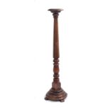 Oak hexagonal and turned column torchere stand, upon turned circular stepped base, 51" high