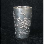 Chinese silver beaker, of tapering cylindrical form, repousse floral decorated, character mark and