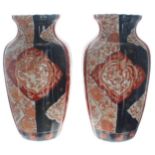 Pair of Japanese Imari baluster vases, decorated with typical palette foliate panels, 12" high (2)