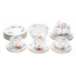 Wedgwood wrythen fluted porcelain part tea service, pattern no. 6305 decorated with floral sprays