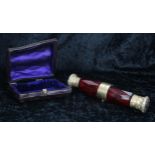 Victorian gilded and cranberry glass double- ended folding scent bottle, one end with hinged