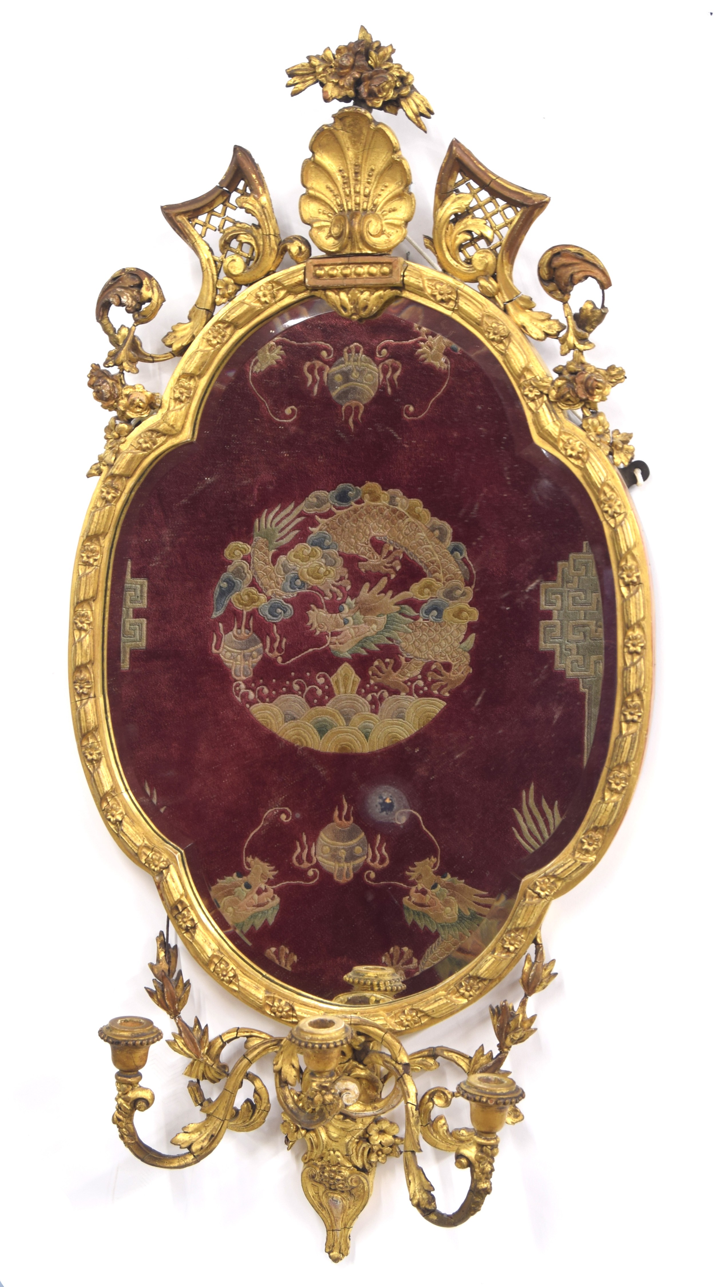 19th century oval giltwood and gesso Girandole mirror, the bevelled plate within a foliate moulded