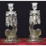Pair of Baccarat clear and frosted glass candlesticks, the sconces applied with pendant lustre drops