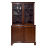 Georgian mahogany library bookcase with double astragal glazed doors enclosing three adjustable