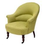 Victorian green polka dot upholstered bedroom armchair, the bowed seat upon short turned feet,