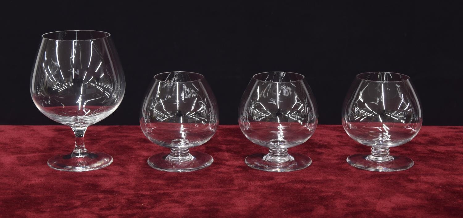 Baccarat - three cognac drinking glasses plus a larger cognac glass, with crown over the letter '