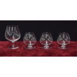 Baccarat - three cognac drinking glasses plus a larger cognac glass, with crown over the letter '