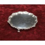 Mappin & Webb silver salver, with a cast pie-crust beaded border upon three scroll feet, engraved to