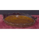 Georgian style mahogany oval brass bound gallery tray, 23" x 16"