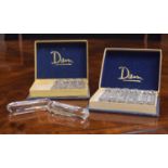 Two sets of six Daum clear glass knife rests, circa 1950s, 3.75" long in the original boxes