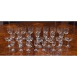 Suite of drinking glasses with engraved floral decoration, possibly Baccarat, comprising seven
