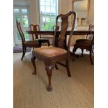 Fine set of six George I walnut dining chairs, with paper scroll top rails over vase shaped