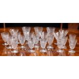 French suite of drinking glasses with scroll designs, possibly Baccarat comprising five champagne