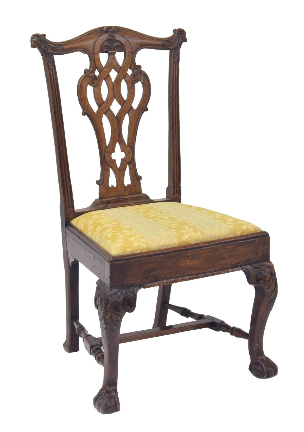 Georgian walnut dining chair, with a pierced and carved interlaced splat and drop-in seat, upon