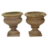 Pair of reconstituted stone garden urns, 17" high, 16" diameter (2)