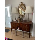 George III mahogany and boxwood strung sideboard of elegant and small proportions, the overhanging