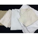 Seven assorted tables cloths of various sizes including four round cloths (7)