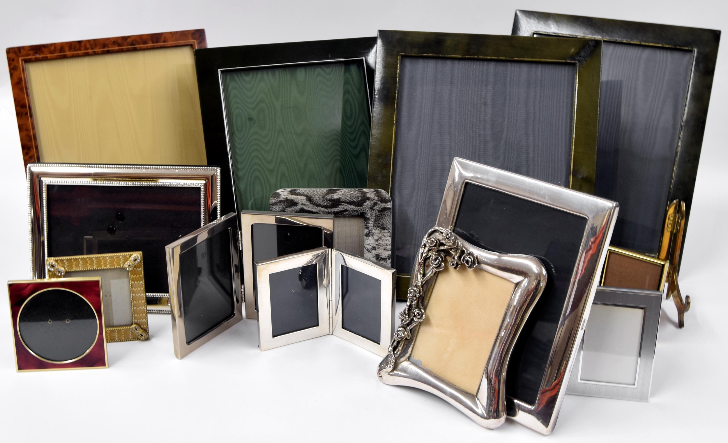 A large collection of photograph frames including four large Mappin & Webb frames, Art Nouveau style
