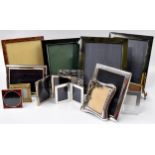 A large collection of photograph frames including four large Mappin & Webb frames, Art Nouveau style