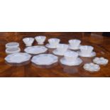 French opalescent glass breakfast set comprising three and six small plates, seven footed bowls, two