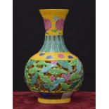 Chinese porcelain bottle vase, with reticulated floral decoration upon a yellow scaled ground,