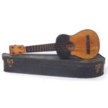 Early 20th century ukulele by and labelled Juan Gomez, Barcelona..., case