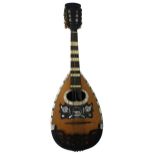 Good Neapolitan mandolin, with rosewood bowl and mother of pearl banded spruce table and sound hole,