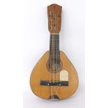 Spanish bandurria by and labelled Casa Gonzalez...Madrid, 1932, with peg tuning