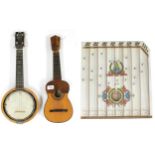 Juan Gomez labelled ukulele; also a Keech Patent Banjulele banjo, ser. no. A 10767, with modern