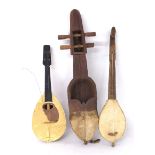 Two ethnic three stringed instruments, Guzla and sarangi; also a child's Neapolitan plastic mandolin