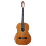 Unusual chamfered body classical guitar; Back and sides: mahogany with chamfered body contours; Top: