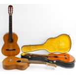 Two Alhambra classical guitars, one with hard case; together with another nylon string guitar (3)