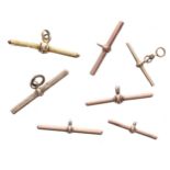 Five assorted 9ct T-bars for watch Albert chains, 10.8gm; with two other gilded T-bars (7)