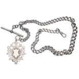 Silver graduated curb watch Albert chain, each link stamped, with T-bar, clasp and medallion fob,